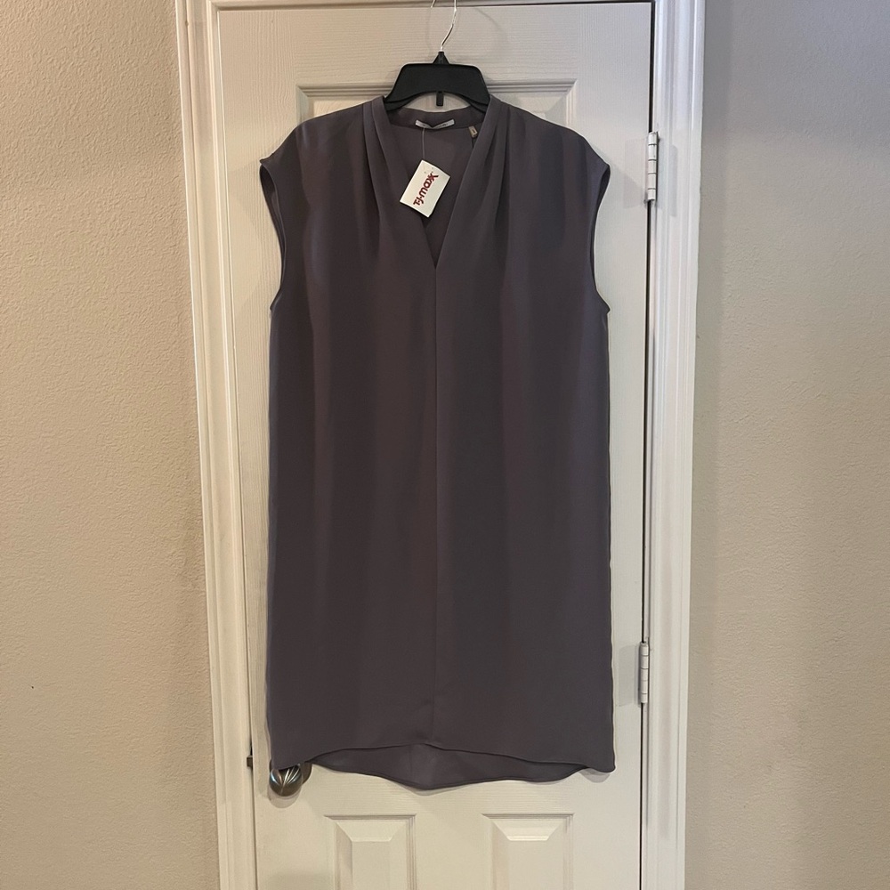 Grey Sleeveless semi- high low hem shift dress.